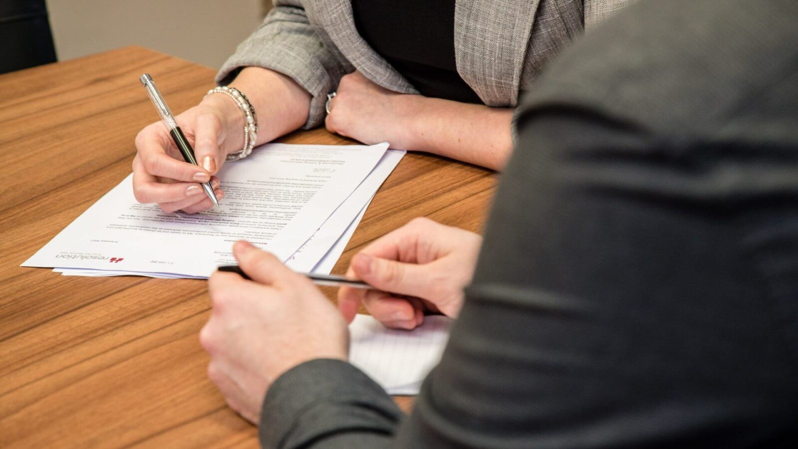 Congleton signing documents
